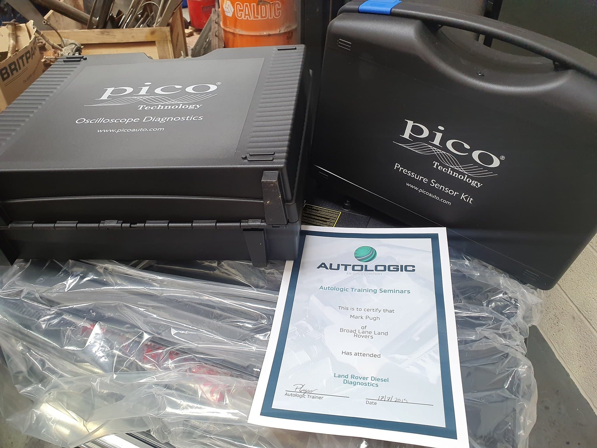 PicoScope oscilloscope diagnostics kit and Pico pressure sensor kit beside an Autologic certificate for Land Rover Diesel Diagnostics